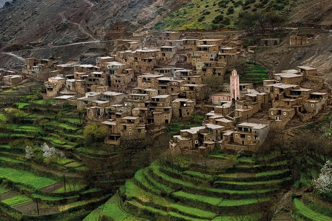 Road winding from the Atlas mountains toward the Agafay desert
